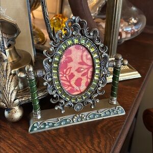 Ornate Jeweled Oval Swinging Brass Frame with Green Faux Gem Details